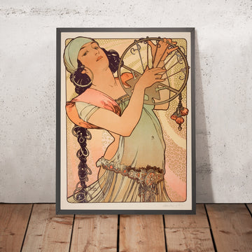 A framed image of Salomé by Alphonse Mucha, 1897