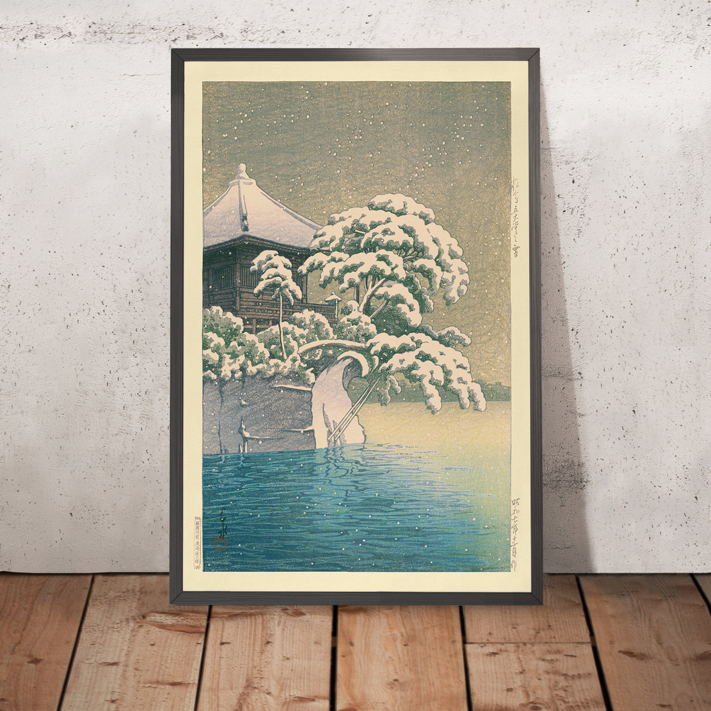 A framed image of Snow at Godaido Temple in Matsushima by Hasui Kawase, 1935