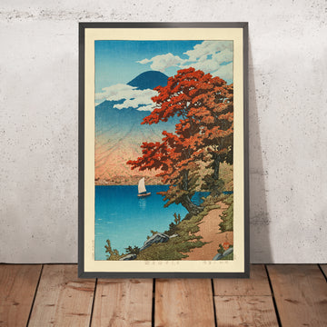 A framed image of Autumnal Lake Chuzenji at Nikko with Mt Fuji by Hasui Kawase 1935