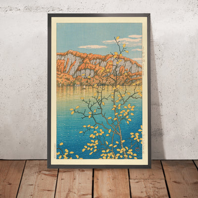 A framed image of Senjo Cliff in Towada Lake by Hasui Kawase, 1935