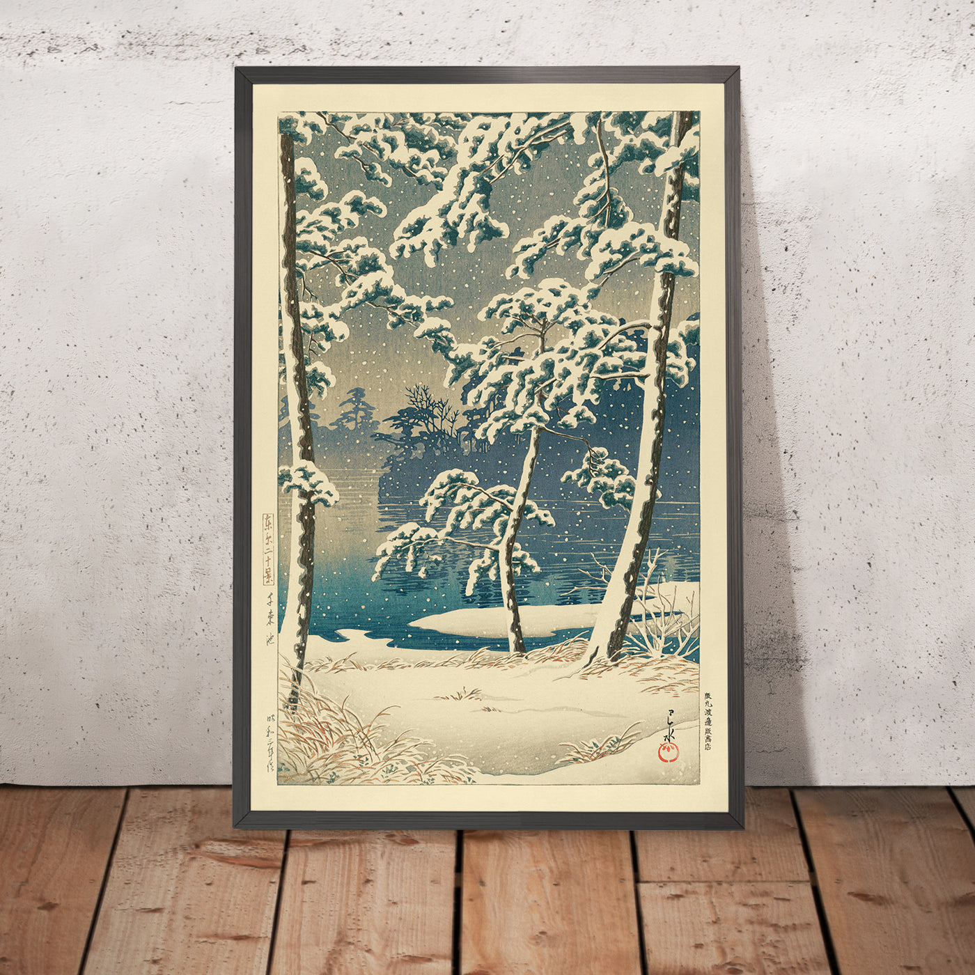 A framed image of Senzoku Pond In The Snow by Hasui Kawase, 1935