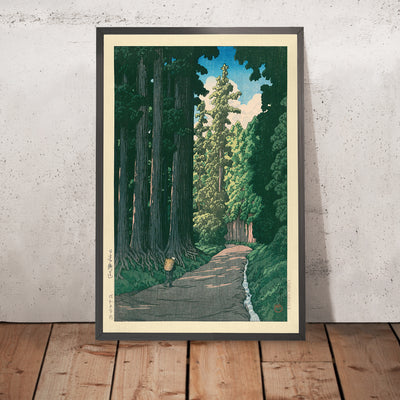 A framed image of The Road to Nikko by Hasui Kawase, 1935